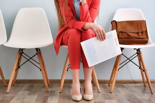 Woman Waiting with a Resume