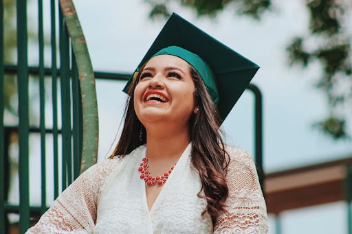 Graduate smiling with cap