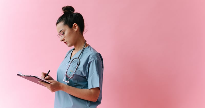 A Doctor Taking Notes