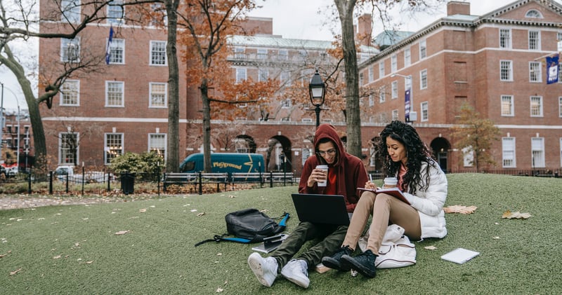Man and Woman Studying at a Park