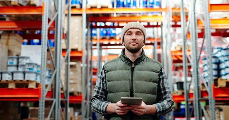 Young Man Working in a Warehouse